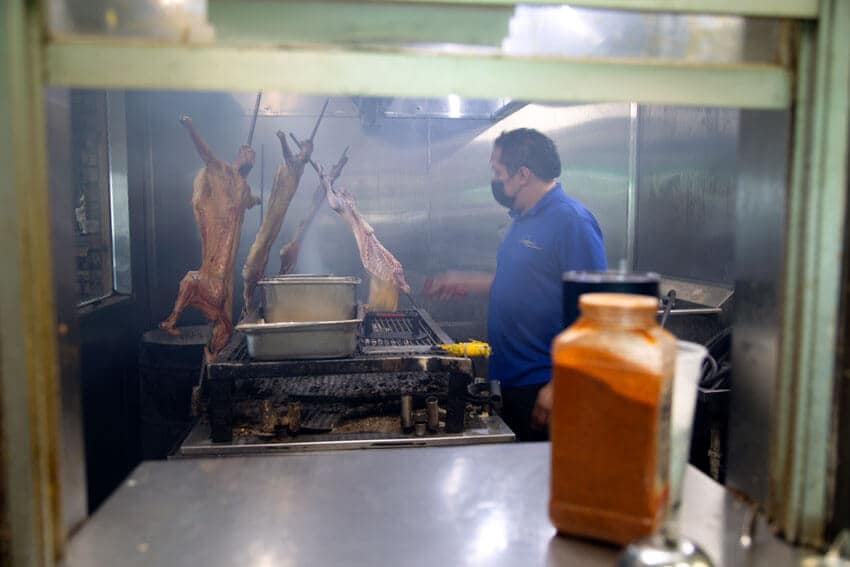 Preparing cabrito in the kitchen!
