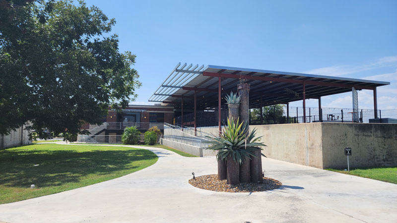 The building for the University Draft House at Firemans Park in the heart of McAllen, TX