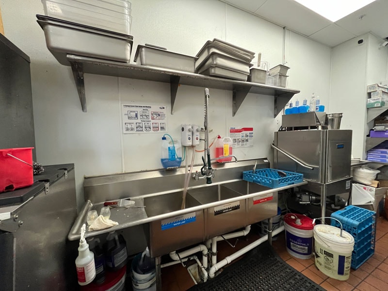 The dishwashing stationg at Mad Hatter Neighborhood Pub in Richardson.
