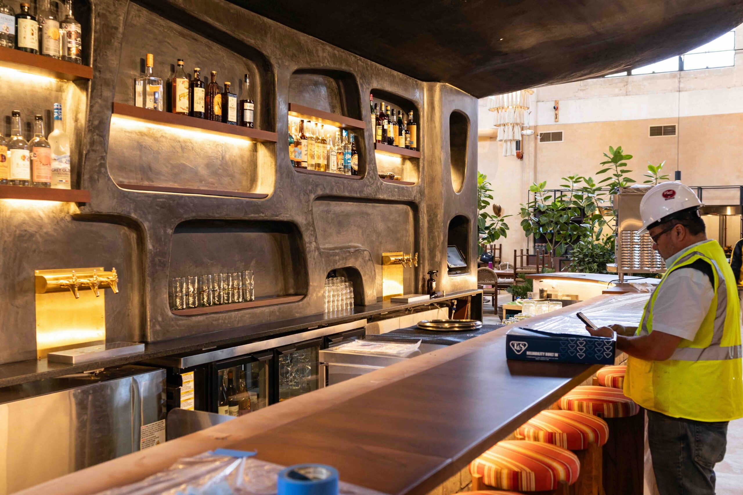man building commercial kitchen bar in a restaurant